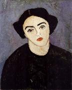 The woman wearing dress in green